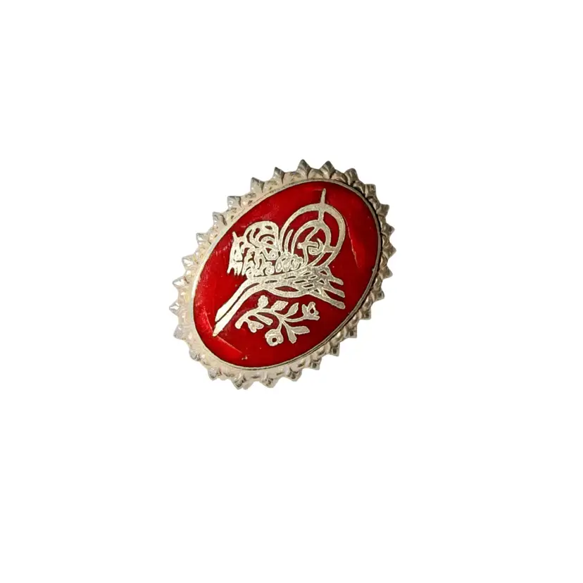 Vintage Siamese sterling silver pin featuring red enamel?