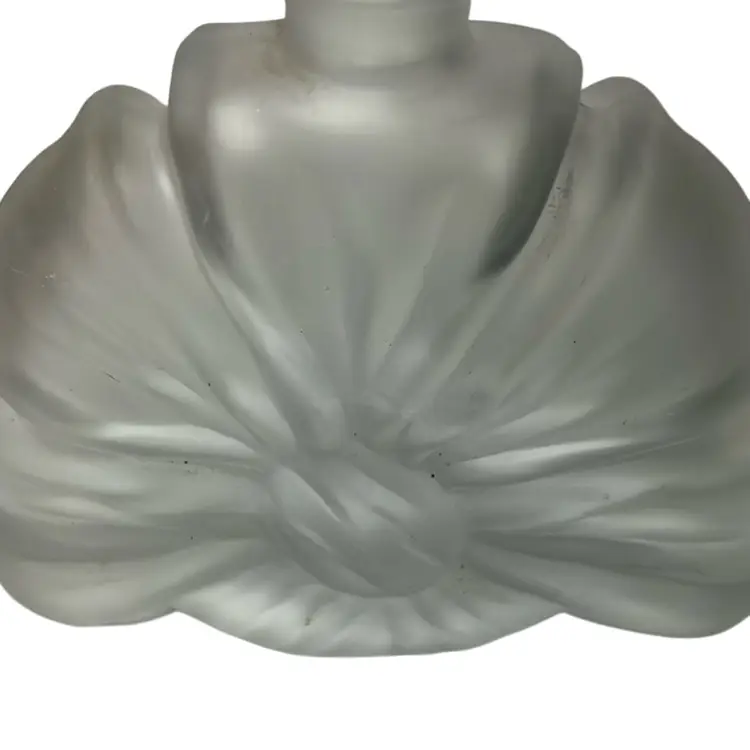 Vintage Perfume Bottle With Original Stopper. Made Of Frosted Glass In The Shape Of A Bow