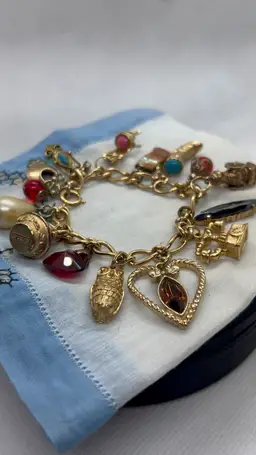 1973 Avon Representative Award Charm Bracelet