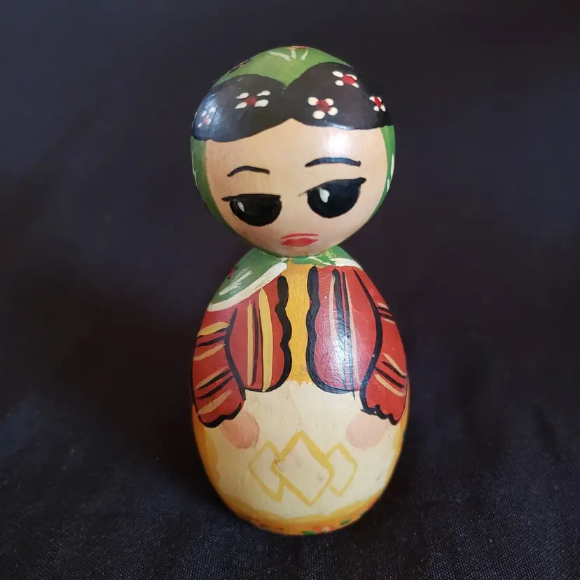 Wood Doll Peasant Woman Handpainted 3 3/4" tall approximately Writing