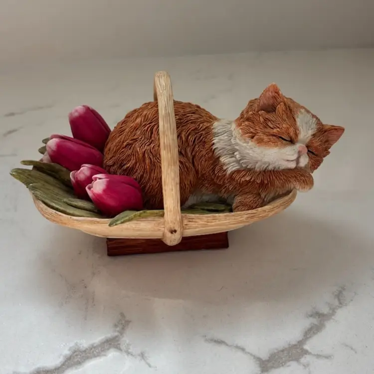 Vintage Orange Tabby Cat Sleeping Inside Basket With Tulips