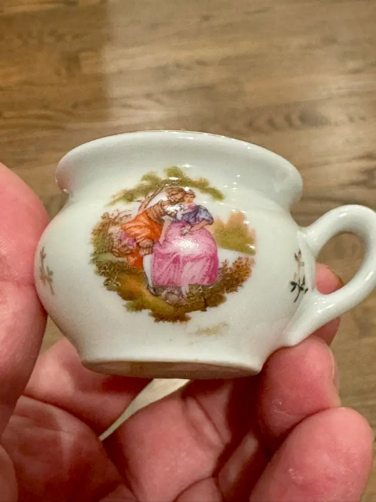 1.5” Limoges mini porcelain cup, courting couple scene & gold trim