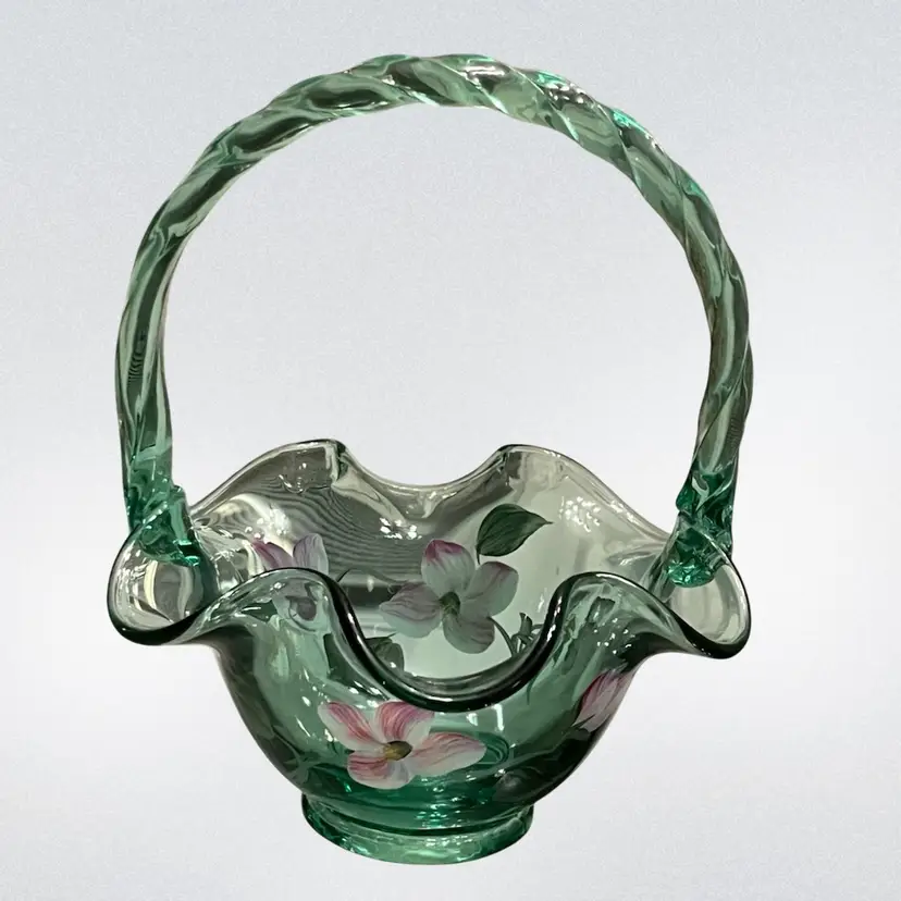 Fenton -Sea Mist Green -Hand Painted Floral Glass Basket Signed   D. Anderson. 7.5” Twisted Handle, Ruffle Rim