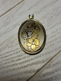 Reed and Barton daffodil goldtone and silver damascene pendant