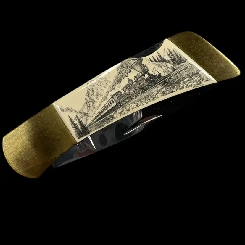Gerber Sportsman 1 Scrimshaw Folding Pocket Knife with Locomotive Train 🚂 Design. White-Paper Colored Micarta Handle. 2-3/4” blade. 6-1/4” total length. 🇺🇸USA Shipping Only. Great Knife For Man Cave,Pocket Knife Collectors, EDC, Father’s Day!