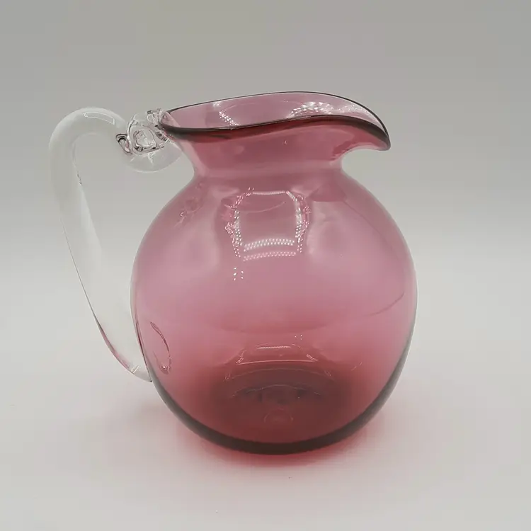 Art Glass Cranberry Pitcher w/ Applied Clear Glass Handle Signed