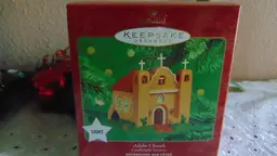 Beautiful pre-owned 2000 Hallmark Christmas Ornament Magic collectors' series Adobe Church Candlelight Services