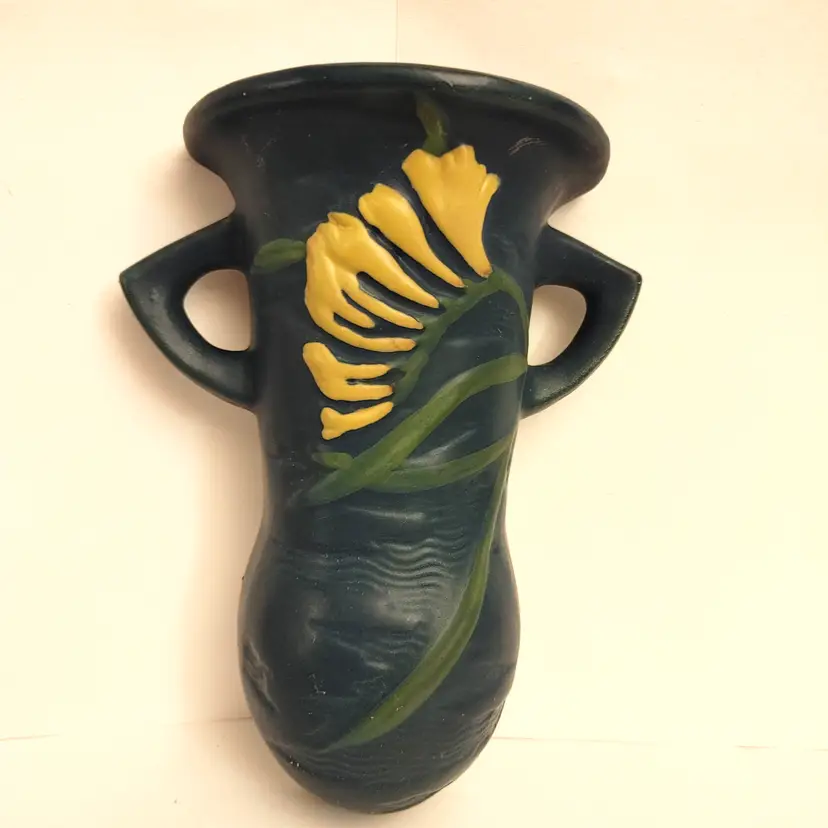 Roseville Pottery Freesia Wall Pocket. 1296-8. Reproduction. Delft blue. No chips or cracks. 8 inches high.