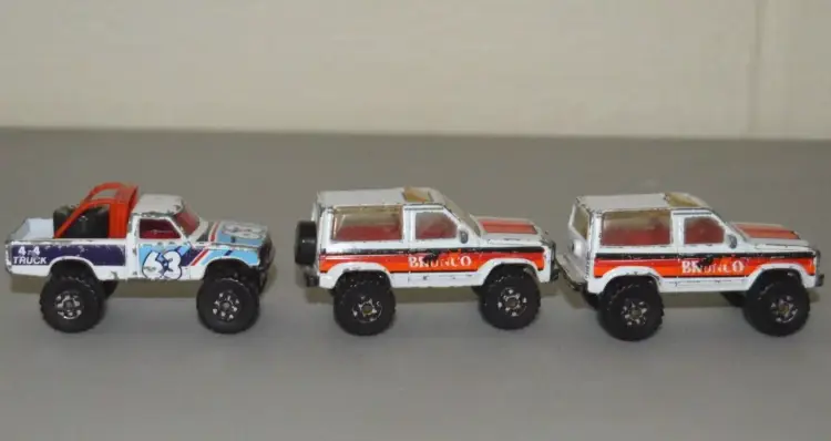 Vintage Matchbox Ford Bronco II Models: 1987 White, Orange, Chrome and 4x4 Truck
