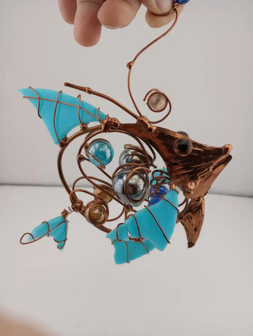 Copper, class, and marble fish ornament