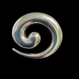 23. Vintage Silvertone Monet Swirl Brooch.