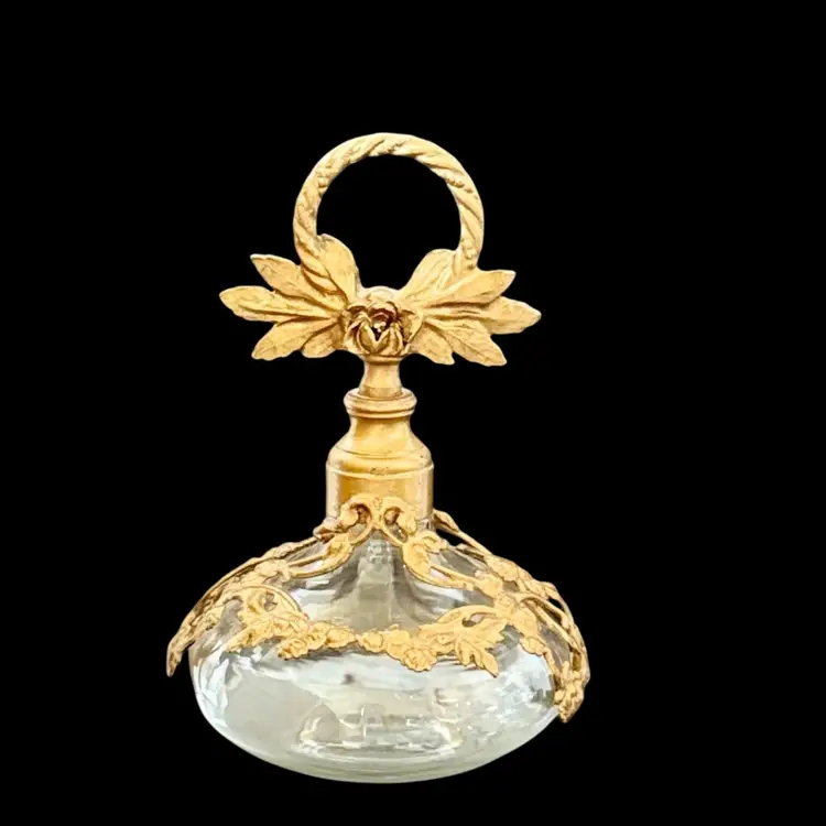 Vintage Perfume Bottle Ormolu Ornate Gold Filigree and Glass Hollywood Regency
4-3/4” T x 3” W
