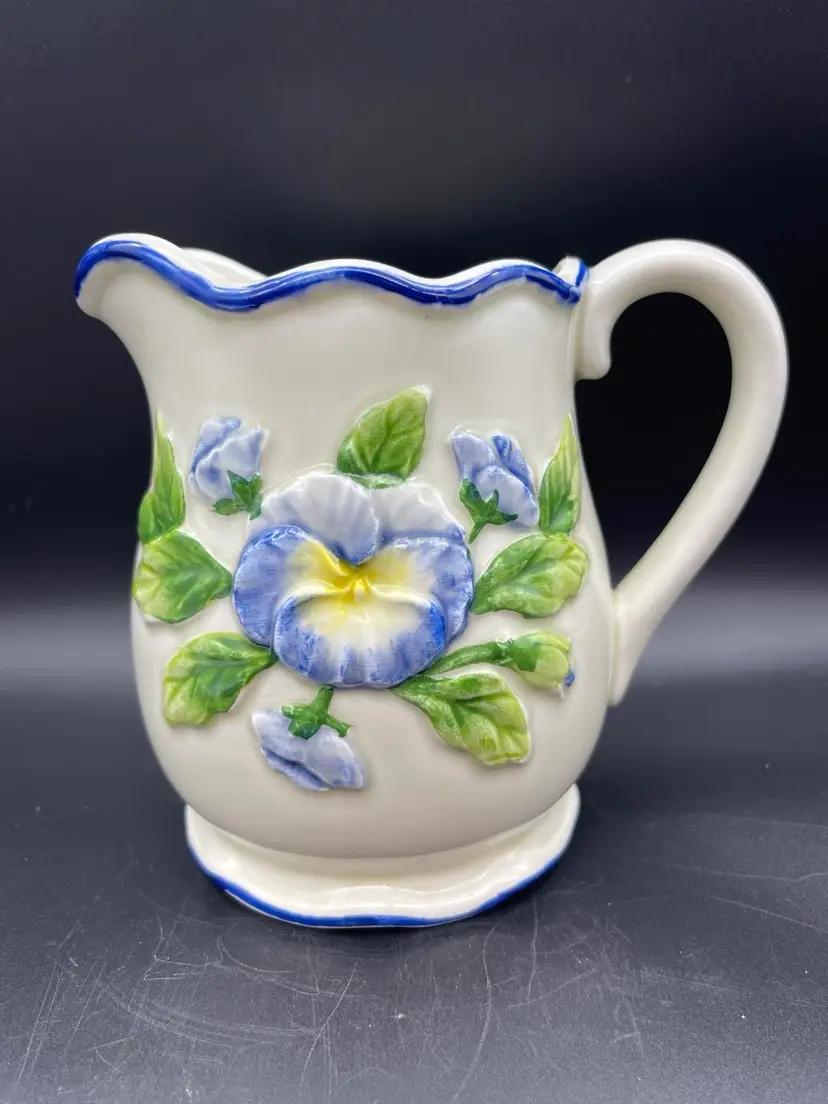 Vintage Otagiri Collections Blue and Yellow Pansy pitcher.  Ruffled Rim and base, embossed floral design