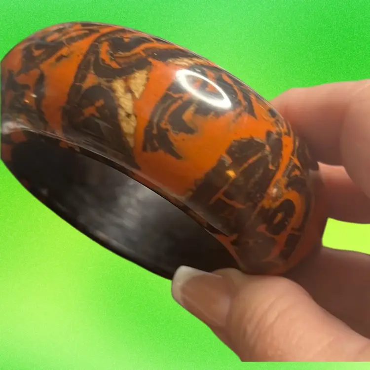 Saffron And Black Painted Bracelet Possible Lucite One And A Half Inches Wide And 2 3/4 Inches And