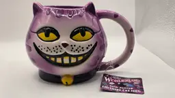 Hand-Painted Cheshire Cat Mug – Wonderland Collection – Spencer’s Gifts