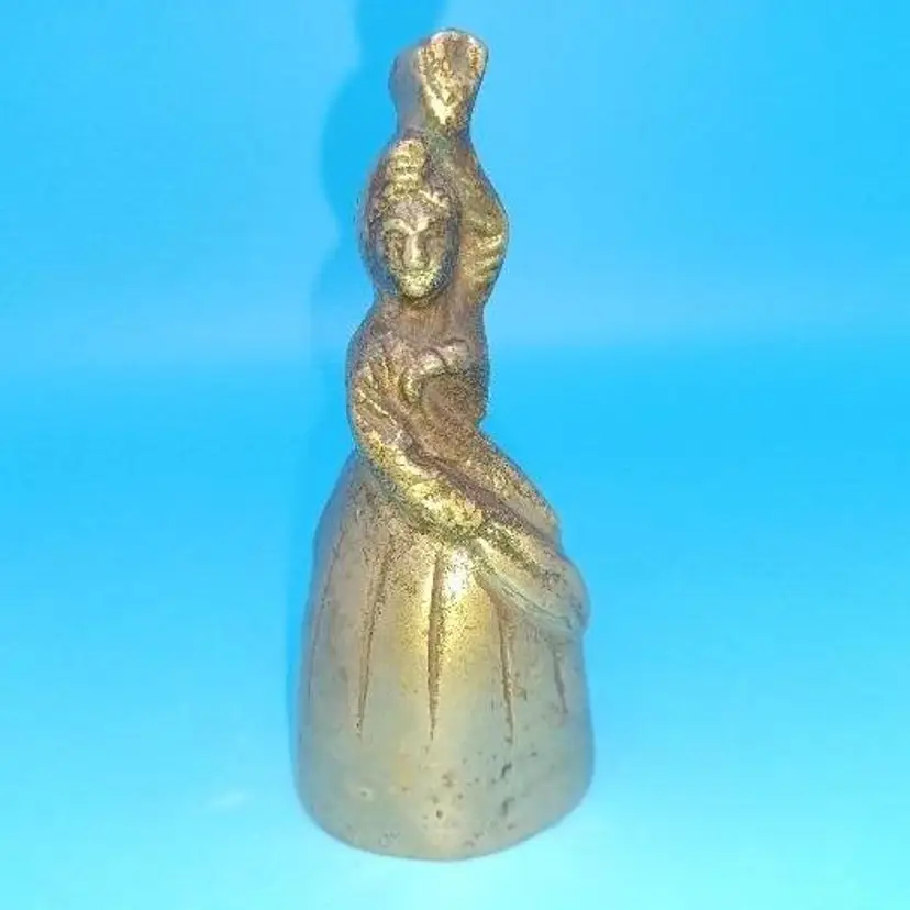 Vintage Brass Bell Women with Long Braid Crinoline Skirt