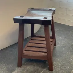 Black Walnut  stool with slated shelf,  Comfortable  Shaped seat and through tenon legs. Made to Order
