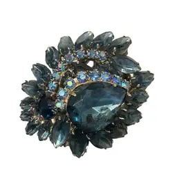 VTG Brooch With Blue Sapphire Colored Stones And Light Blue AB Smaller Stones