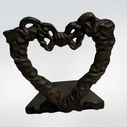 Unique Vintage Cast Iron “Hearts” Bookends/Door Stops