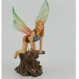 #01 Fairy kneeling on a tree trunk