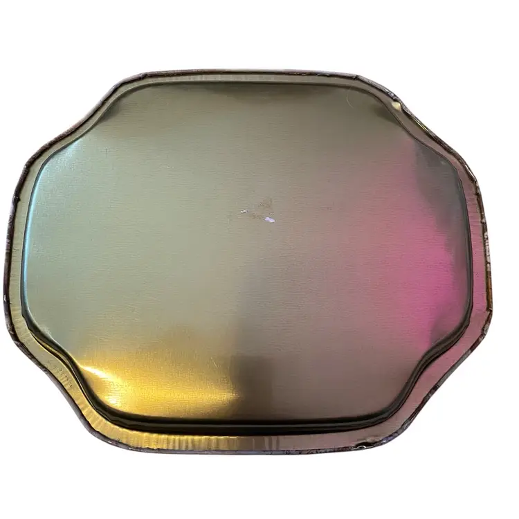 This is a vintage metal serving tray featuring the "American Homestead Winter" scene by Currier & Ives