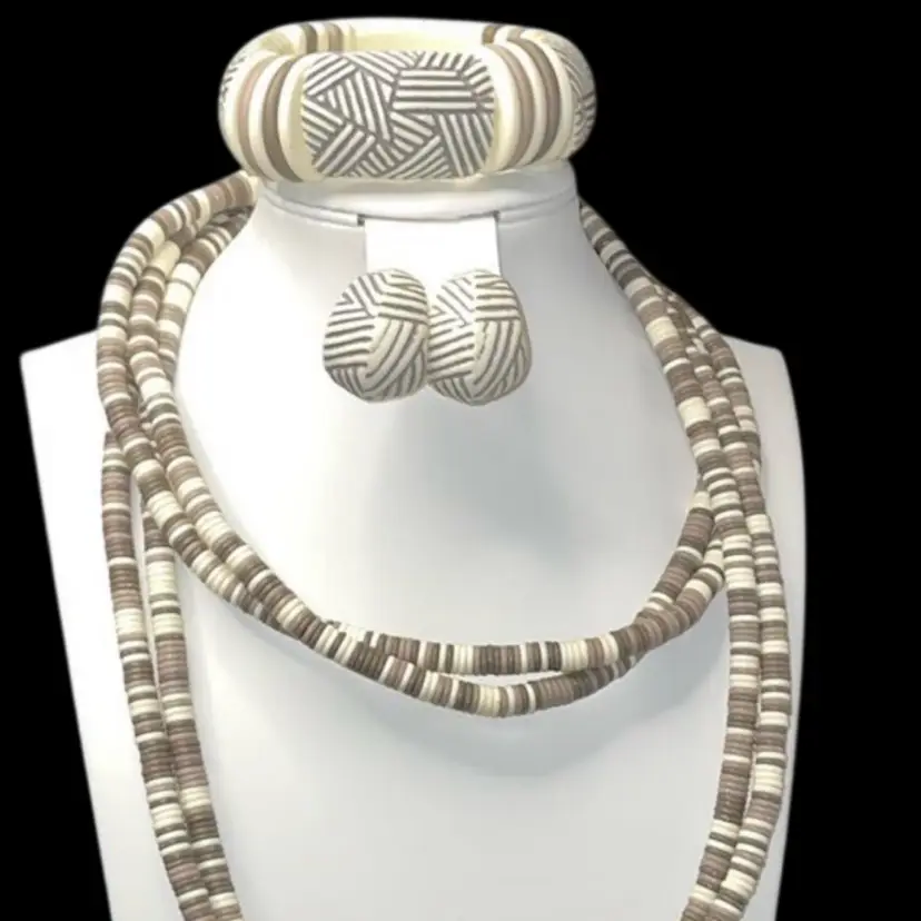 Vintage Avon Sirocco tribal patterned resin jewelry set. Bracelet Pierced Earrings And Necklace Double Strand 36 Inches.