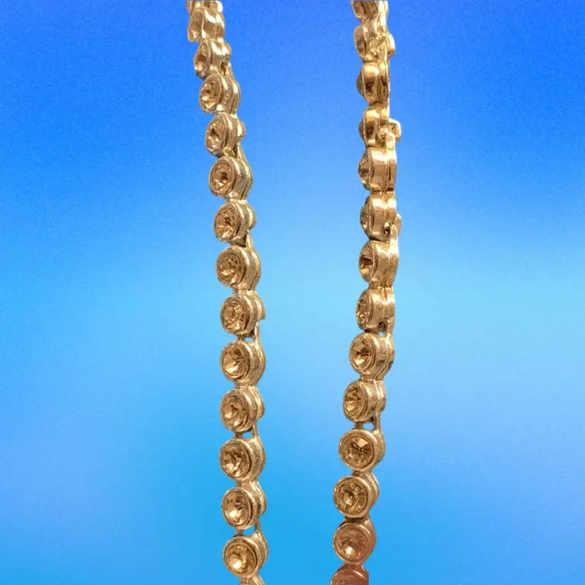 Avon NR Silver Tone Single Strand Bezel Set Rhinestone Necklace  With A Drop