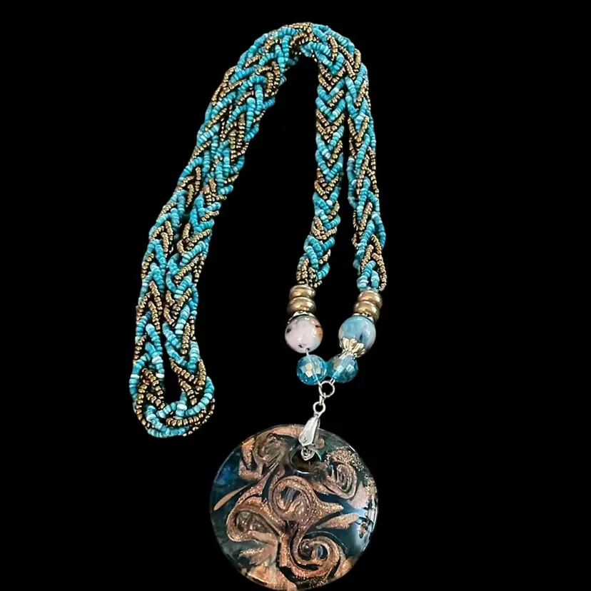 Glass Braided Necklace With Golden Twisted Floral Inside Glass