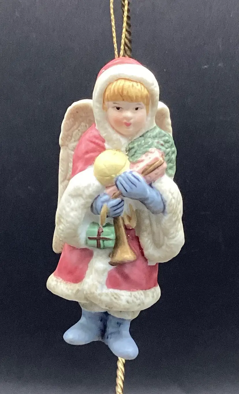 Porcelain 1995 Angel Holding Gifts Dressed In A Christmas Coat Sated And Numbered