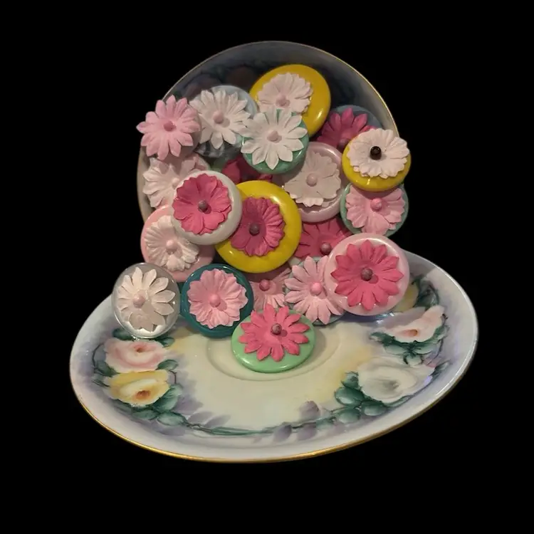 Overflowing Button Flower Garden In Antique Handpainted Tea Cup And Saucer