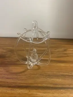 Vintage Hand Blown Glass Ornament with Bird in a Cage 3 1/2” H x 2 1/2” W x 2 1/2” D.