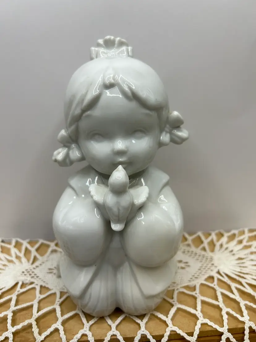 White Little Girl Holding A Bird 6 1/2