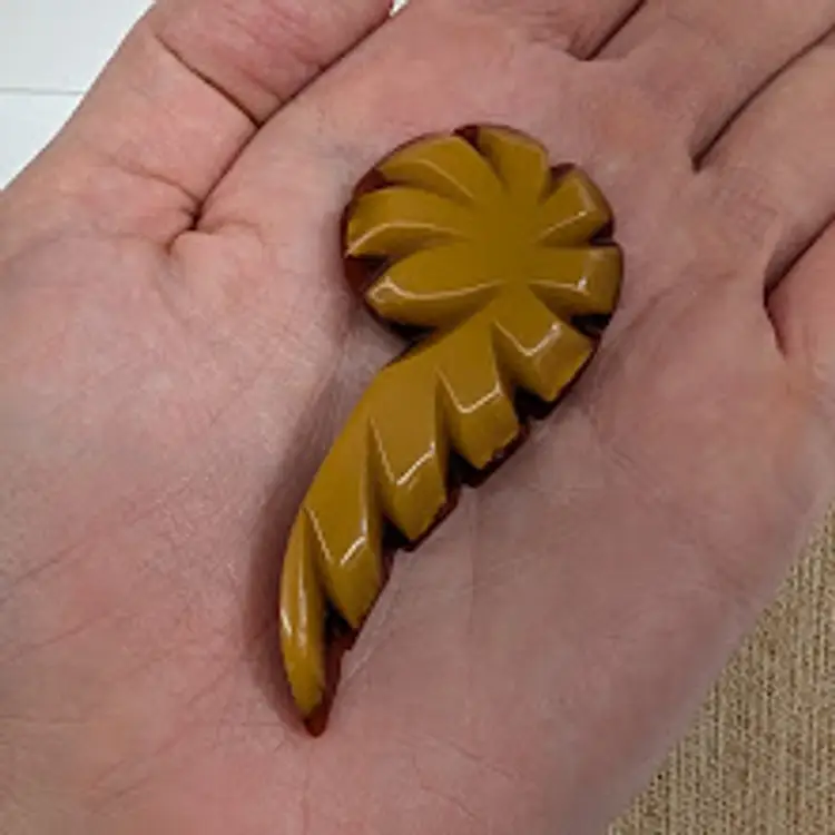 Vintage Laminated Bakelite Brooch in Butterscotch and Dark Red Deep Carved Swoop