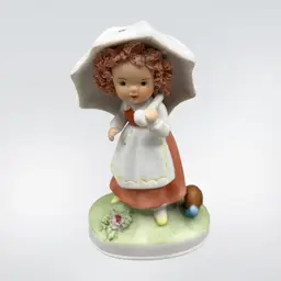 Ceramic Girl Figurine With Snail Spaghetti Hair 4”