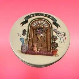 A decorative collectible tin or plate from the "Cozy Country Corners" series