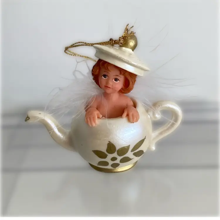 Adorable Little Girl In A Teacup Ornament