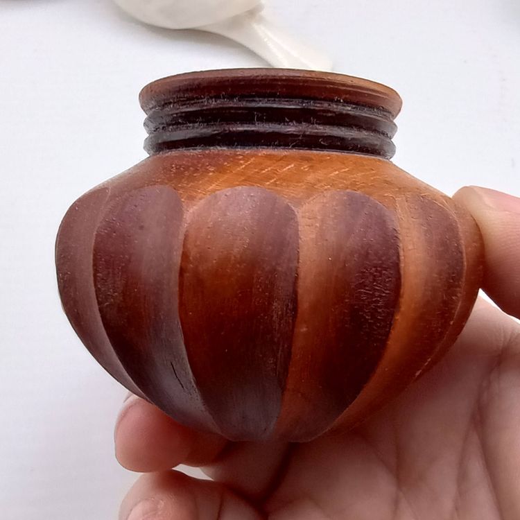 Hand-carved wooden mini pot, signed