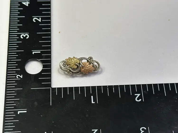 Tri Color Leaves Pendent On Silver toned Bracelet