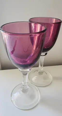 Two Heavy Cranberry Coloured Wine Glasses