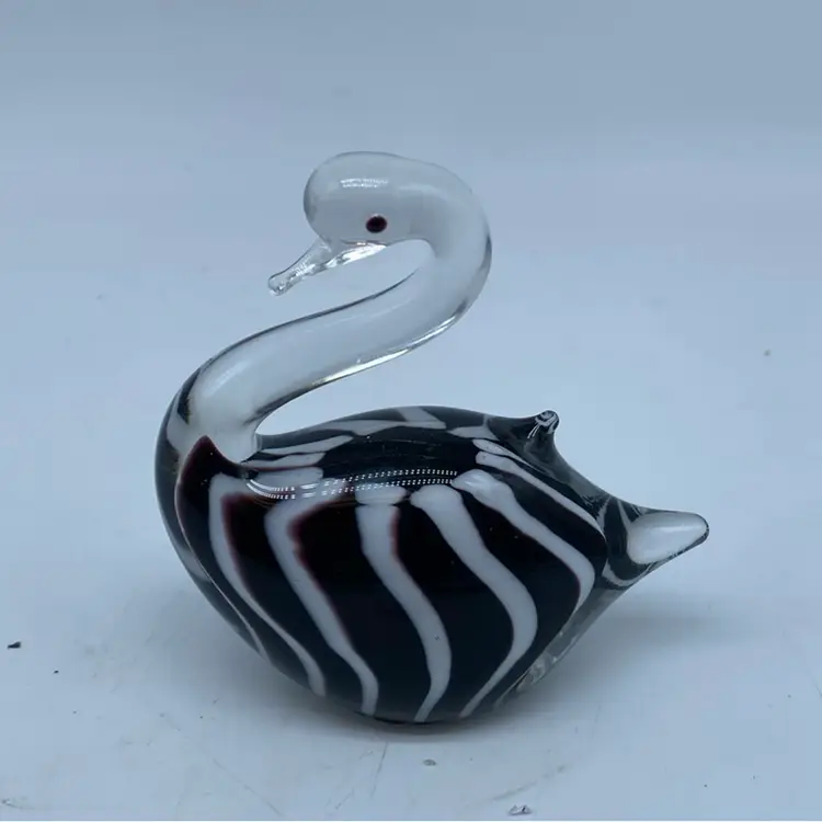 #1468 Hand-blown art glass swan paperweight with black and white stripes.