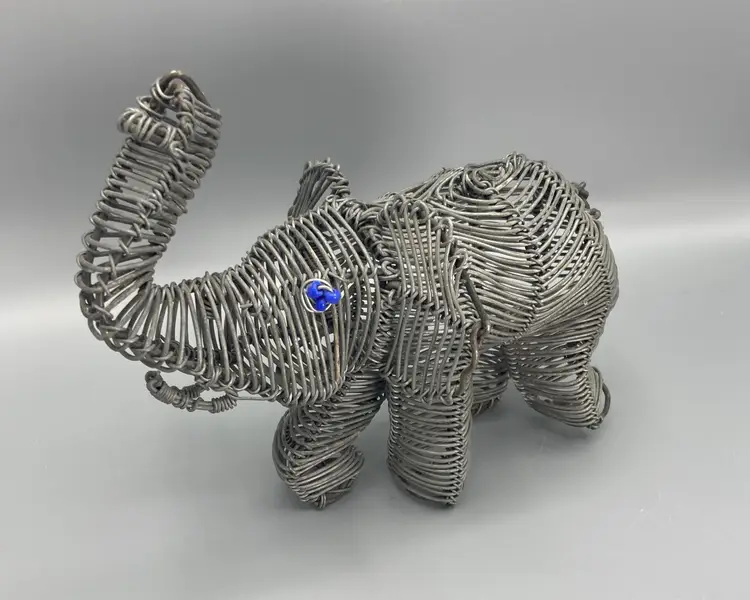 Recycled Metal Elephant Sculpture with Blue Eyes - Trunk Up