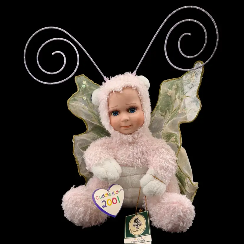 Geppeddo Cuddle Kids Doll “Bridget Butterfly” Porcelain Face Plush Pink Body  2001  NIB
12.25” (sitting)