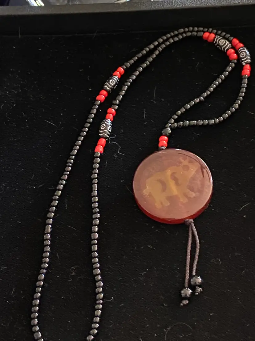 Vintage Tibetan Black Glass Beads & Red Beads w/ Pendant adorned with Bull