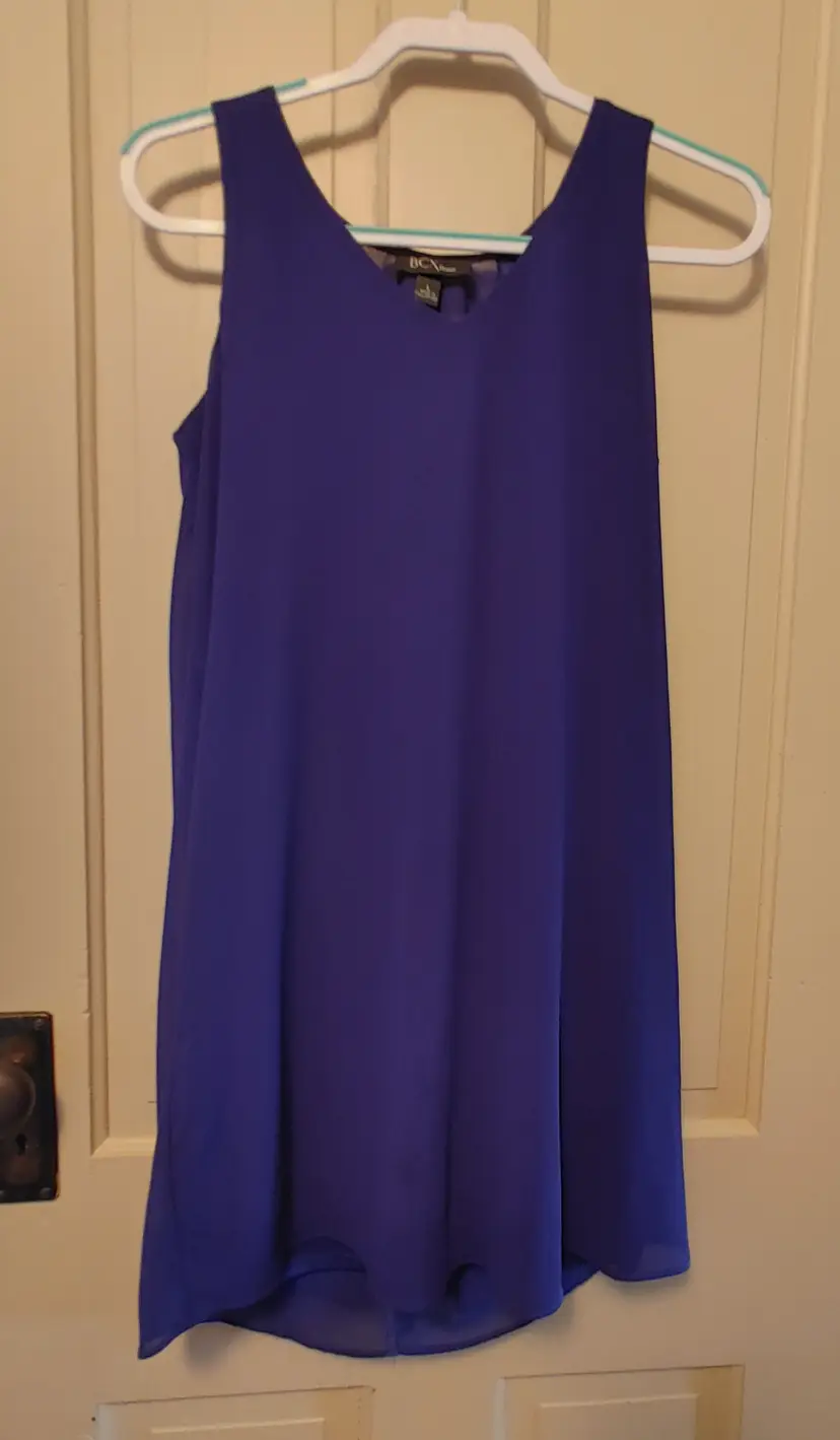 Dress- Brand: BCX Dress. Size Large. Dark purple dress. Material: 100% polyester. No callouts.