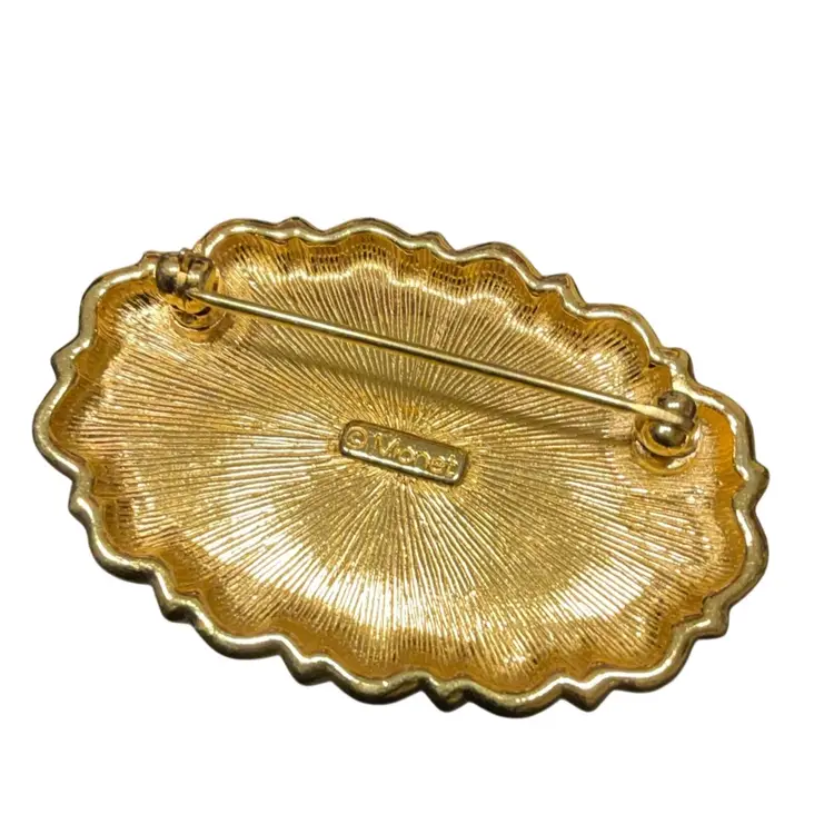 Monet Gold Tone With Blue Stone Cabachon Brooch.