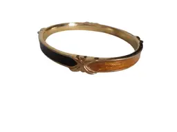 Vintage Estate Trifari Black Gold Bangle bracelet X accents Gold tone