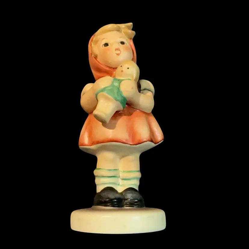 Vintage Goebel M.J. Hummel Figurine Titled “ Girl With Doll” Also Known By Model # HUM 239/B . Goebel Germany