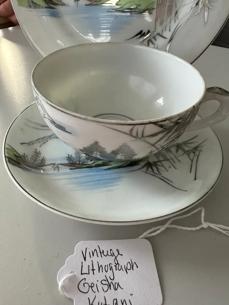 Tea Cup And Saucer And Side Plate