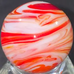 1 1/8" Signed Red And White Flame Marble UV Glow Front And Back Photos