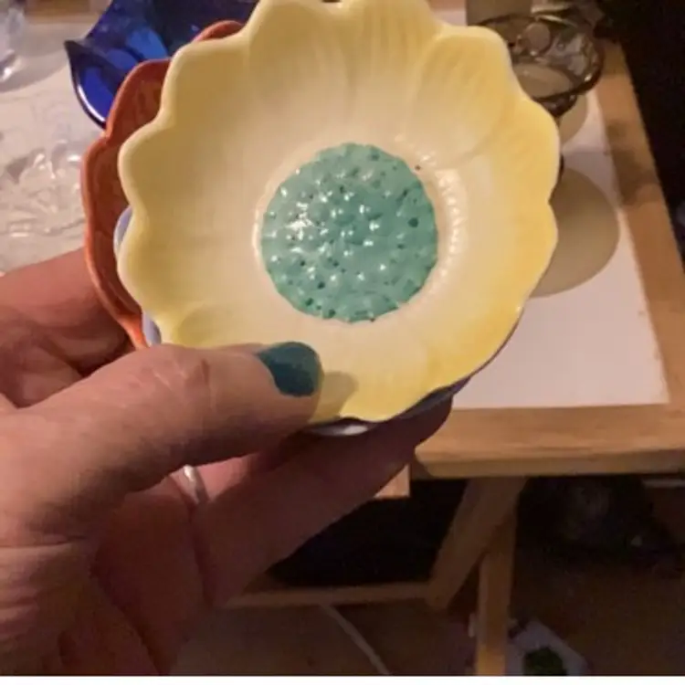 Three little bowls, yellow blue, and orange